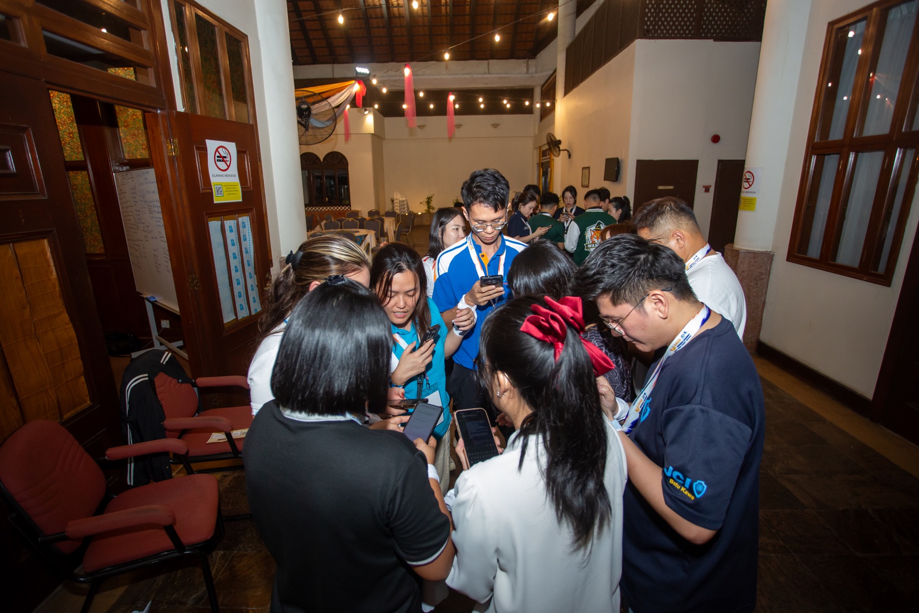 Academians collaborating during a night challenge
