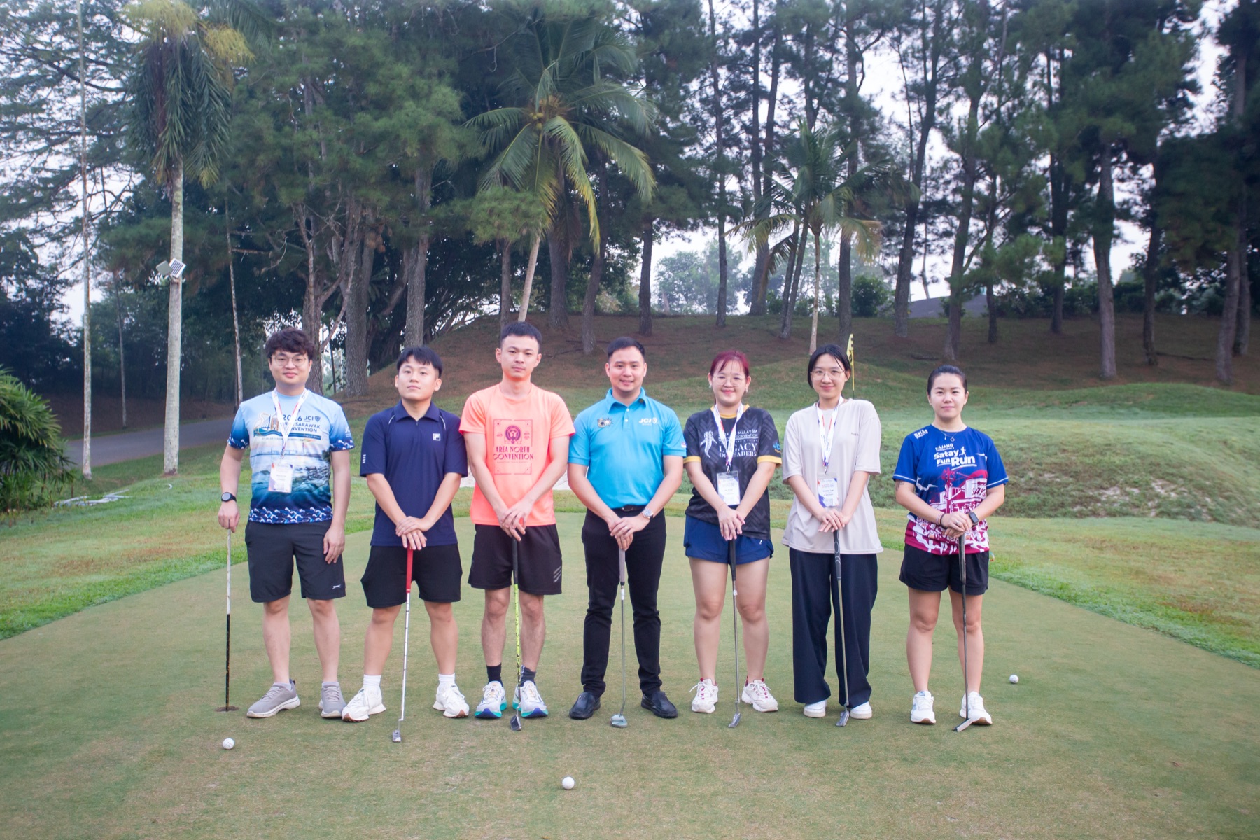 Academians gathering on the golf green at the start of Day Two